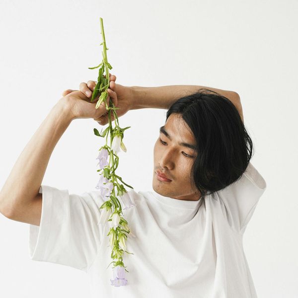 A person in a calm, balanced pose with a peaceful expression.